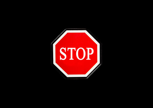stop sign on black background