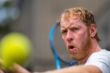 social Tennis player, hitting a forehand close up, in Melbourne Australia