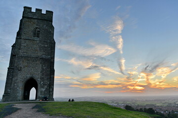 vewi of glastonbury tor against a beautiful sky at sunset © 1000 Words