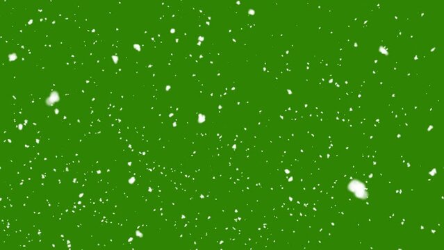 Snow falling on green background