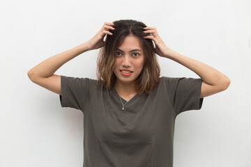 asian young woman scratching head with hand - obrazy, fototapety, plakaty