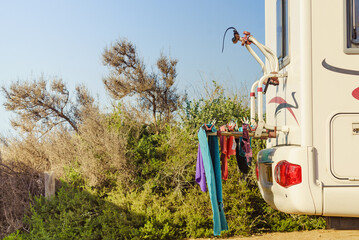 Fototapeta na wymiar Caravan with clothes to dry