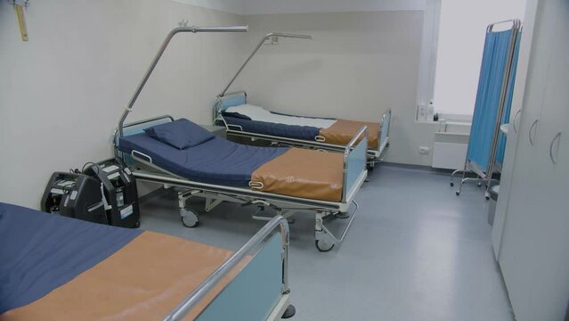 Empty hospital patient's room. Gurney beds in the recovery ward
