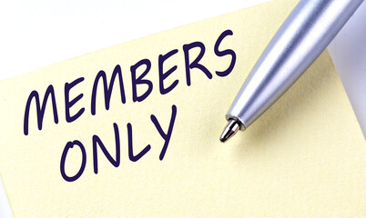 Sticky Note Message MEMBERS ONLY with pen on the white background