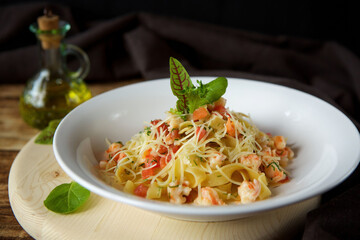 Pasta with cheese and seafood. Italian cuisine.