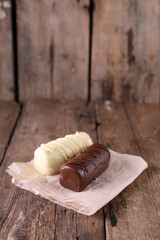 Homemade glazed curds in white and milk chocolate