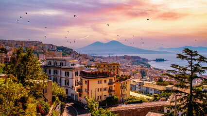 Beautiful view of Naples city with Mount Vesuvius at sunset