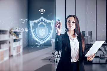 Attractive young european businesswoman with abstract web protection and thumbprint id safety...