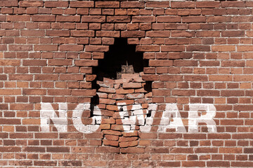Backsteinmauer mit Graffiti