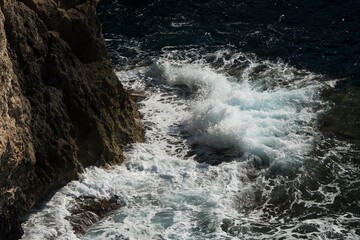 Sea waves, water detail, tide at sklalisk. Sea water in Mallorca, Spain.