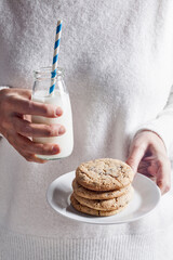 chocolate chip cookies and milk - 490065326