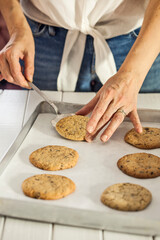hands of a person preparing cookies - 490066305