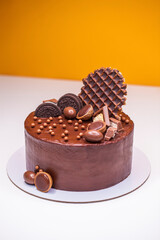 Homemade chocolate cake decorated with sweets