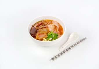 Yen Ta Fo or Thai spicy pink noodle soup isolated on white background