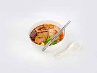 Yen Ta Fo or Thai spicy pink noodle soup isolated on white background