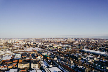 city panorama of an industrial city on a sunny winter day