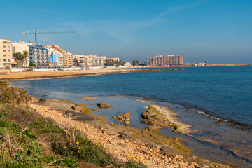Obraz premium Playa de los Locos in the coastal town of Torrevieja next to Playa del Cura, Alicante, Valencian Community. Spain, Mediterranean Sea on the Costa Blanca