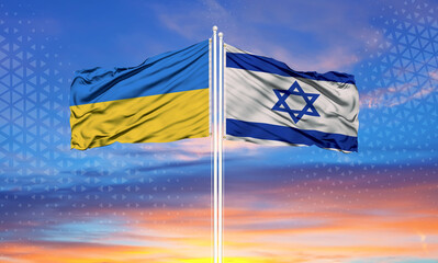 Ukraine and Israel two flags on flagpoles and blue sky..