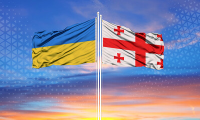 Georgia and Ukraine two flags on flagpoles and blue sky..