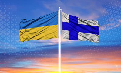 Ukraine and Finland two flags on flagpoles and blue sky..