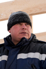 Portrait of an installer at the construction of an ice town