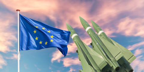 Official flag of the Europian Union in front of tactical missile weapons