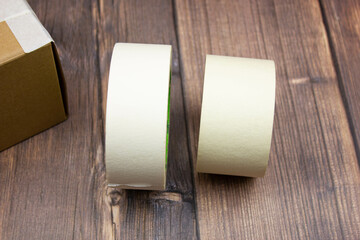 Scotch tape close-up. Seal boxes with tape. Not transparent adhesive tape. Paper tape tape.