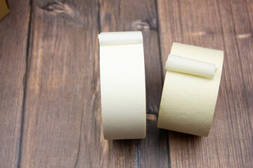 Scotch tape close-up. Seal boxes with tape. Not transparent adhesive tape. Paper tape tape.