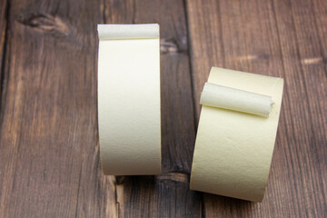 Scotch tape close-up. Seal boxes with tape. Not transparent adhesive tape. Paper tape tape.