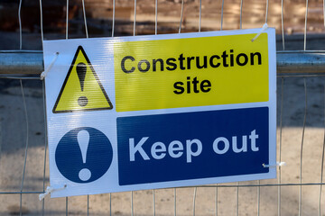 Construction Site Keep Out Sign on a Perimeter Fence - 490080984