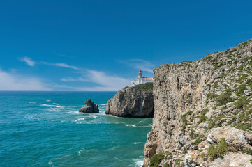 Fototapeta na wymiar Lighthouse at Cabo de Sao Vicente near Sagres in the Algarve