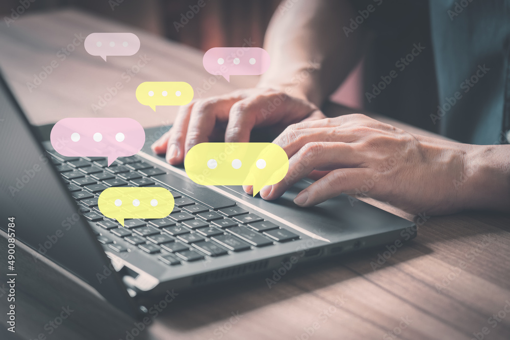 Poster Man using laptop on wooden table . Business concept with live chat online on communication sites, digital media applications and social networks.