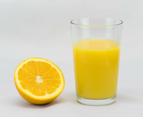 orang and a glass of orange juice
