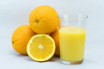 Fresh orange juice and oranges