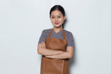 Asian woman Barista waitress using wearing apron welcoming guests gesture
