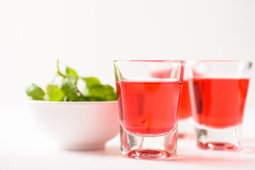 Red tequila with lime and mint on white background, Tropical spring and summer vacation concept