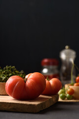 Fresh tomato on black background. Organic vegetable from Thai farmer in local market