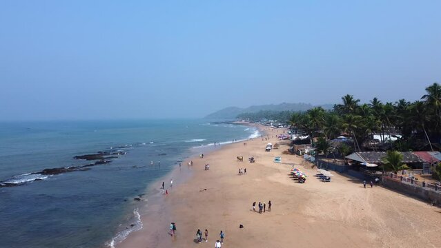 Anjuna Beach, Goa, India.Flight over the sandy beach, 2 hours before the sunset. Arabic see and it's warm and calm waves!