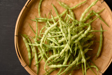 Organic local vegetable from northern Thai farmer  market on black background