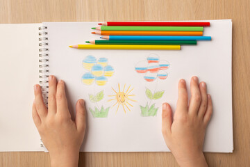 A child's drawing with a call to stop the war. Drawing in the colors of the flags of Russia and...