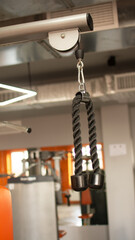 Fitness or bodybuilding concept background. Product photograph of old iron dumbbells on grey, conrete floor in the gym. Photograph taken from above, top view with lots of copy space