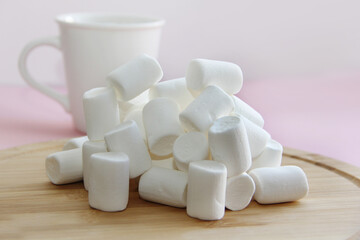 chaska with tea or coffee and a mountain of marshmallows