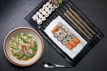 Various dishes of Asian cuisine with typical sushi