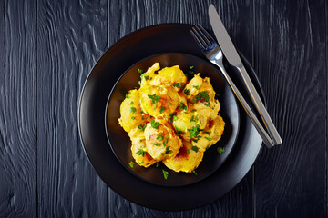 baked young potatoes with cheesy mornay sauce