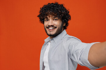 Close up fashionable magnificent fun overjoyed excited young bearded Indian man 20s years old wear...