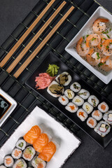 Various dishes of Asian cuisine with typical sushi