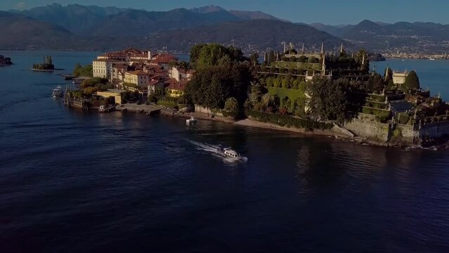 ISOLA BELLA BY LAGO MAGGIORE. PARK AND CASTLE ON ISLAND IN ITALY. 4K DRONE AERIAL FOOTAGE. High quality 4k footage