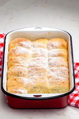 traditional Czech stuffed buns in baking tray
