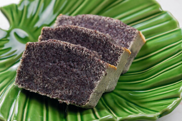 slices of poppy cake on green plate