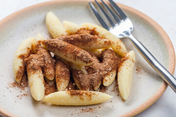 Austrian schupfnudeln with sugar and cocoa